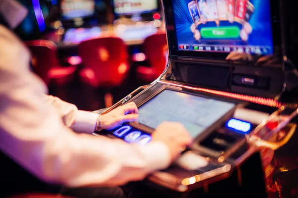 A young woman relaxing with her phone while dynamic casino elements float around her, illustrating the smooth mobile experience offered by the SOUL776 app.